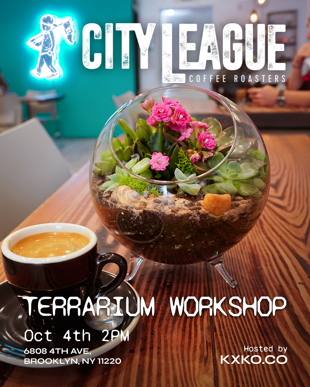 Mini glass globe terrarium with succulents, moss, sand, and stones
